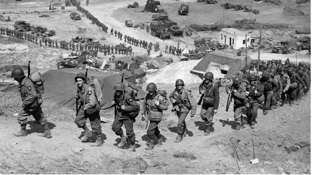 WWII soldiers marching